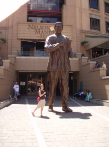Lisa right of Nelson Mandela stature